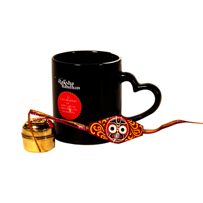 Heart handled coffee mug, traditional Vishnu rakhi, a brass tin with roli chawal inside