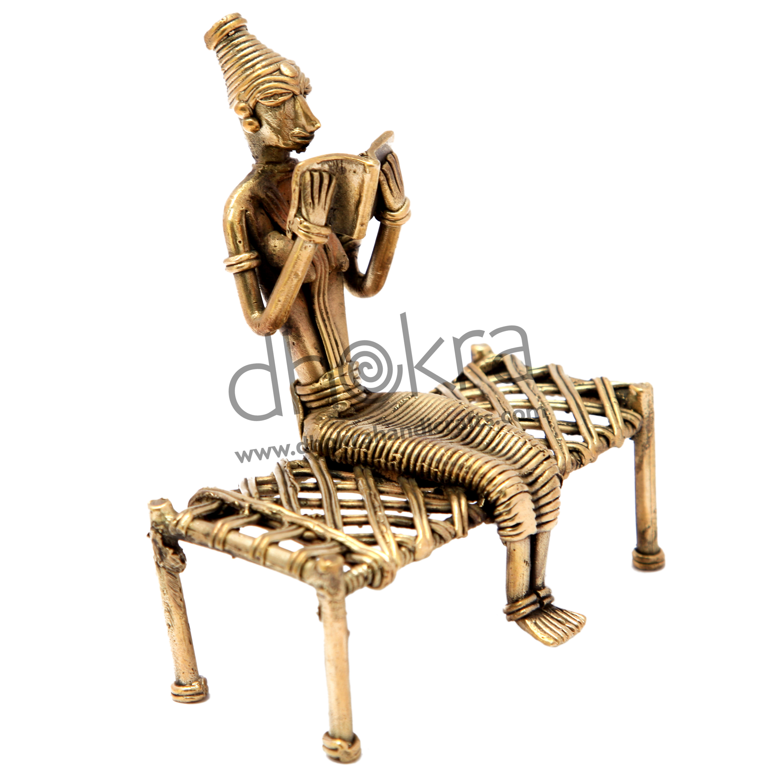 Dhokra Lady Sitting on a Cot